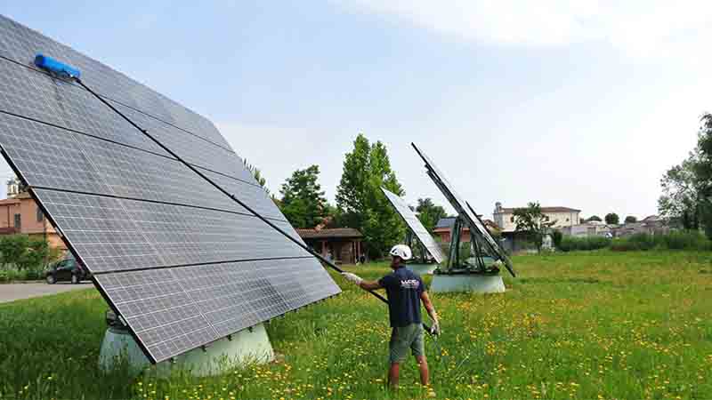 Ground mount solar panel cleaning